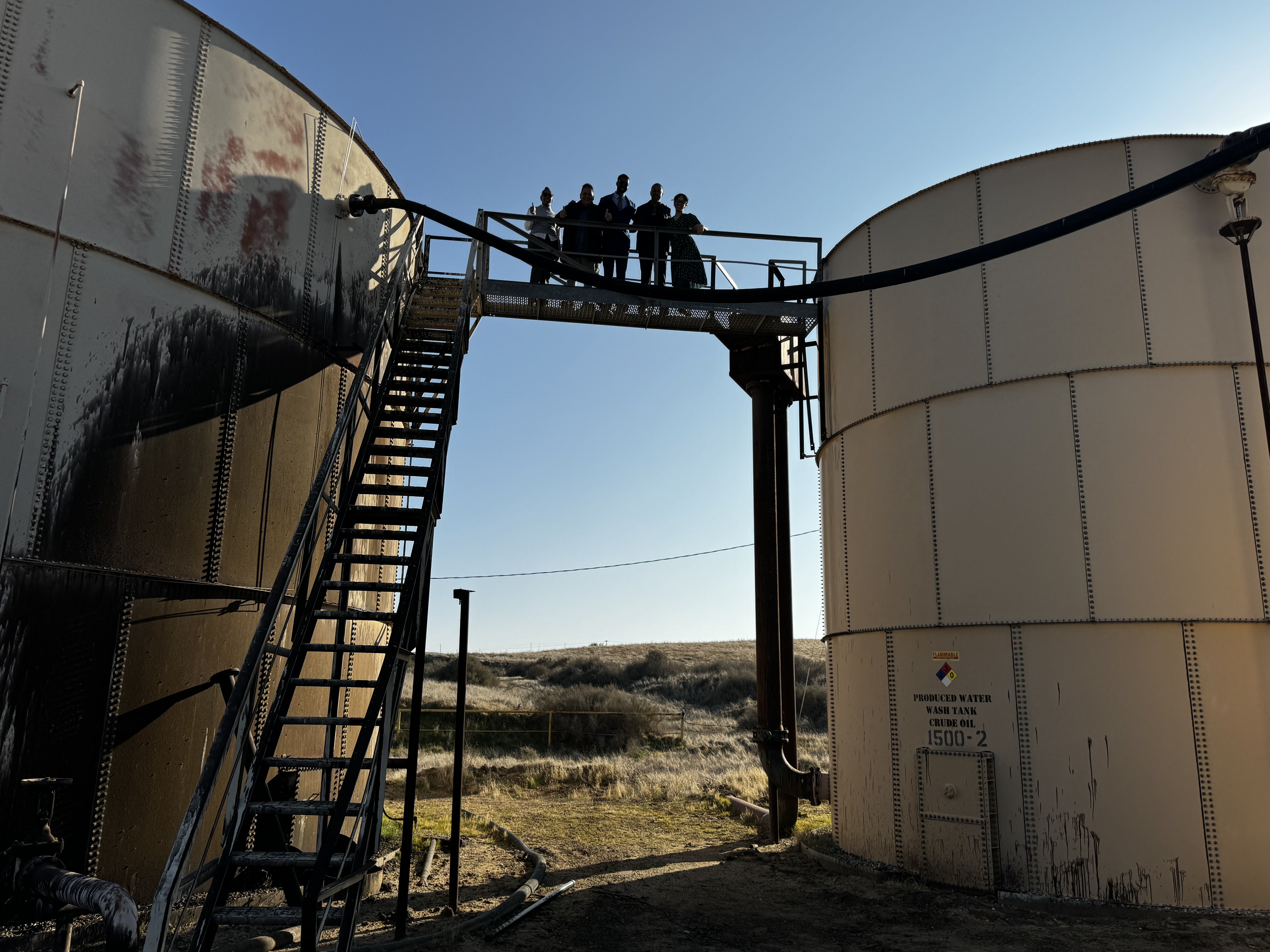 Dez Peña and team at an oil production site