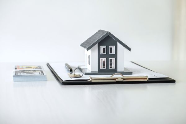 House Model and Money, House Key Lying on Real Estate Contract, House Model and Money, House Key Lying on Real Estate Contract,