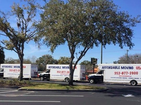 Long-distance moving truck being loaded