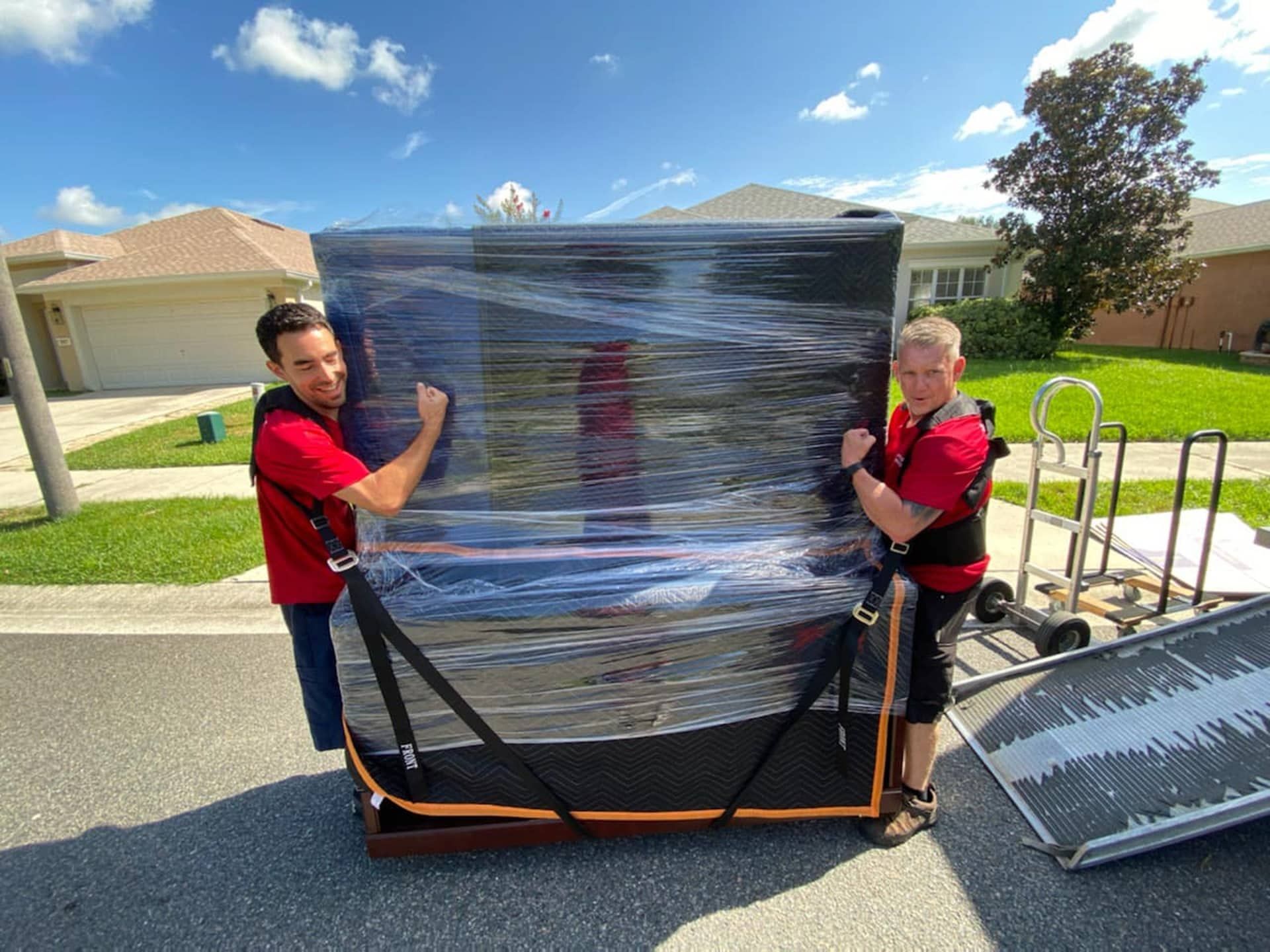Affordable Moving USA mover using loading ramp