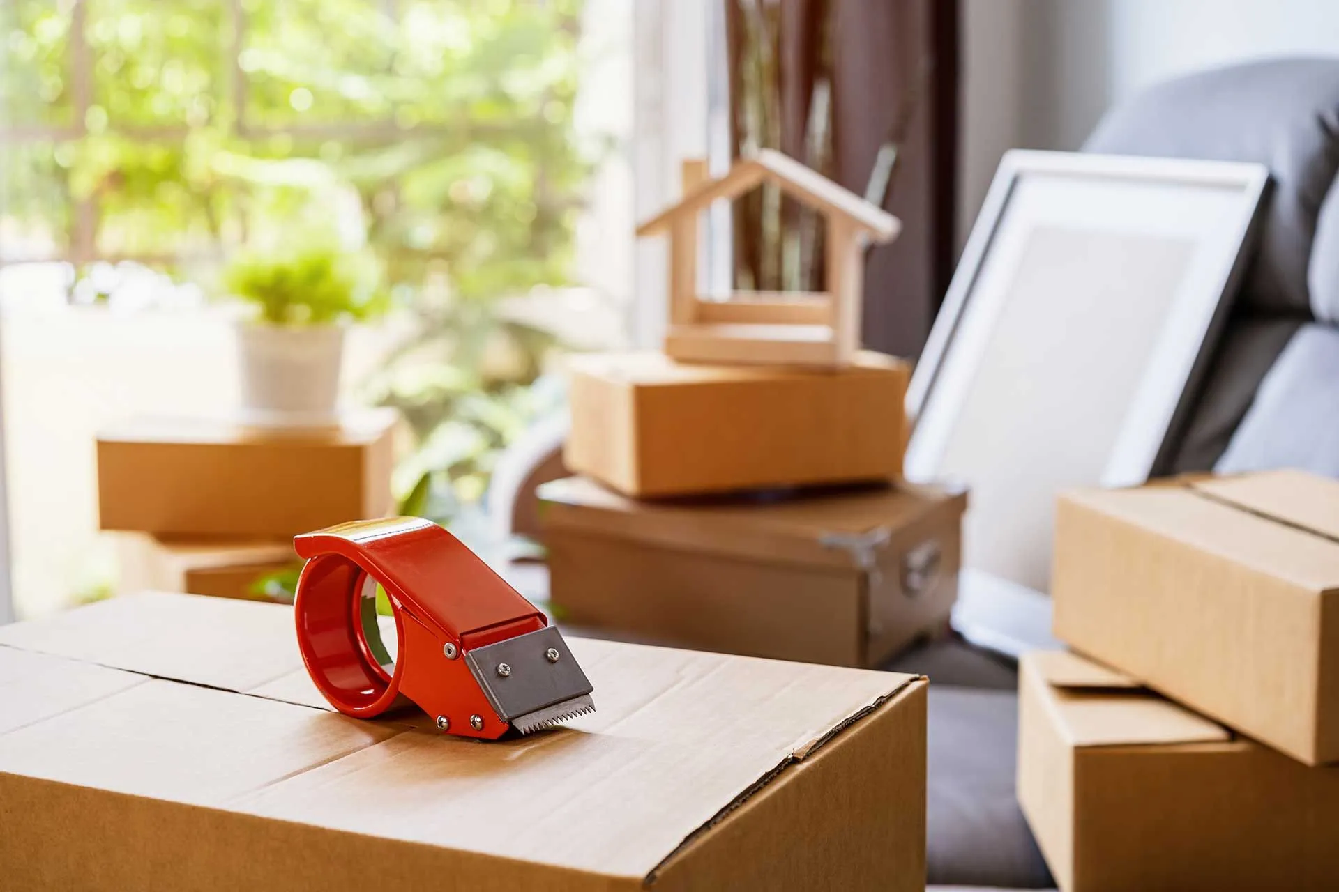 Movers loading boxes into a moving truck