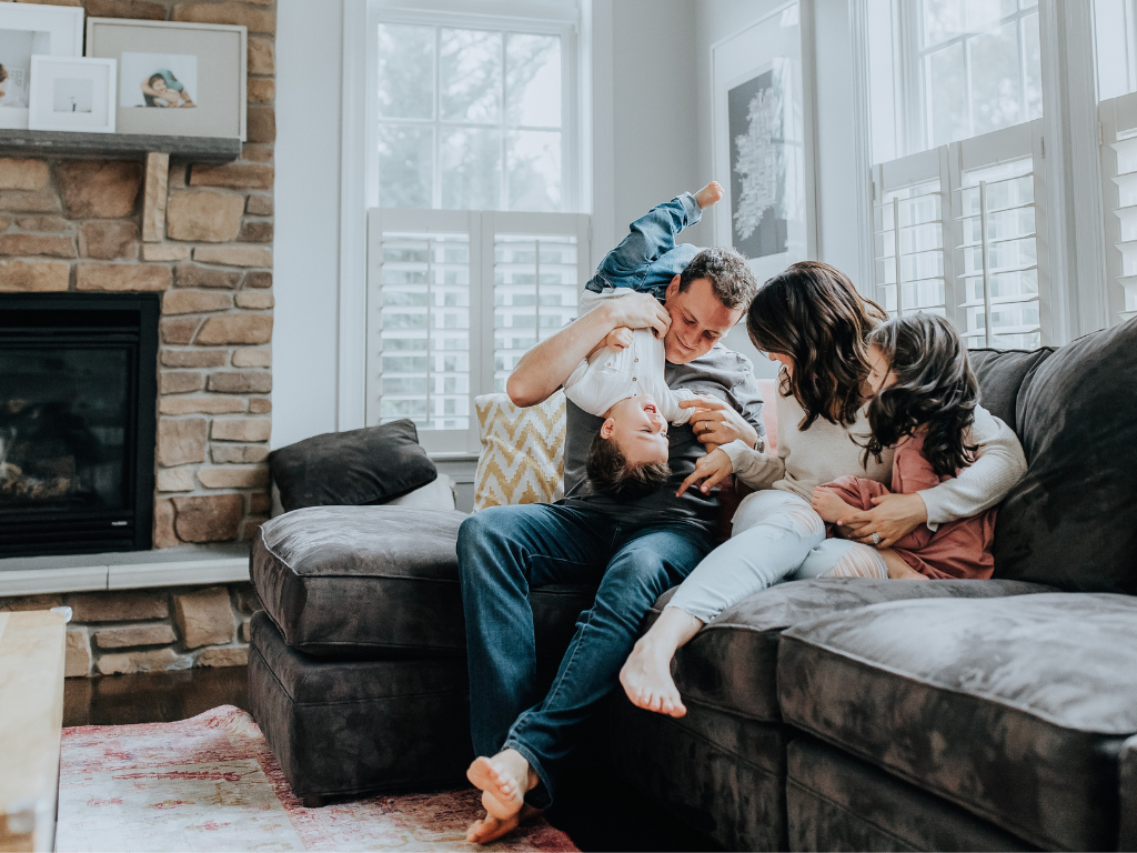 Happy family enjoying their home