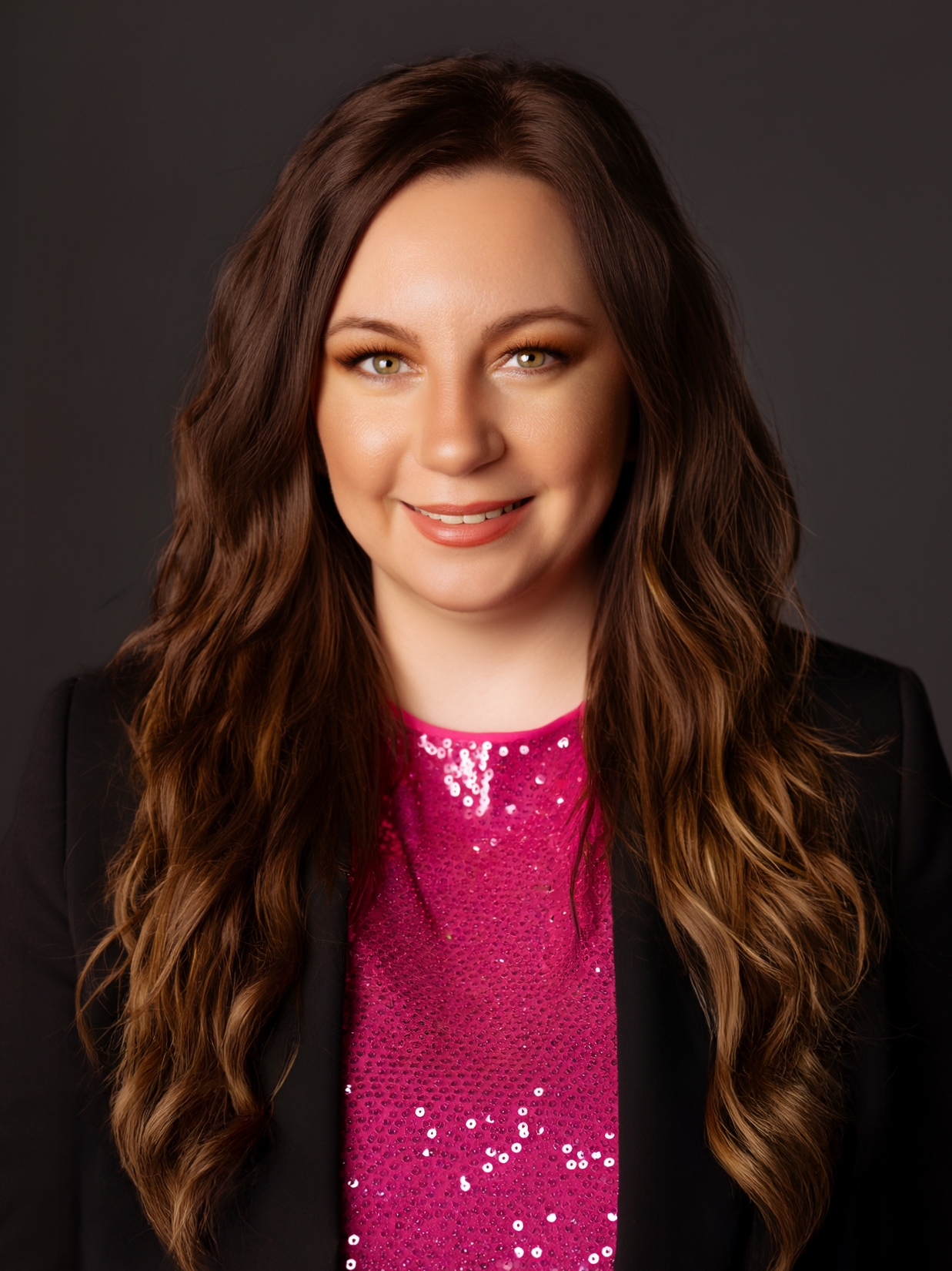 Deanna Kelbaugh, owner and photographer of Moonlight and Lace Boudoir