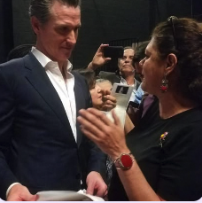 Vivian speaking with Governor Gavin Newsom