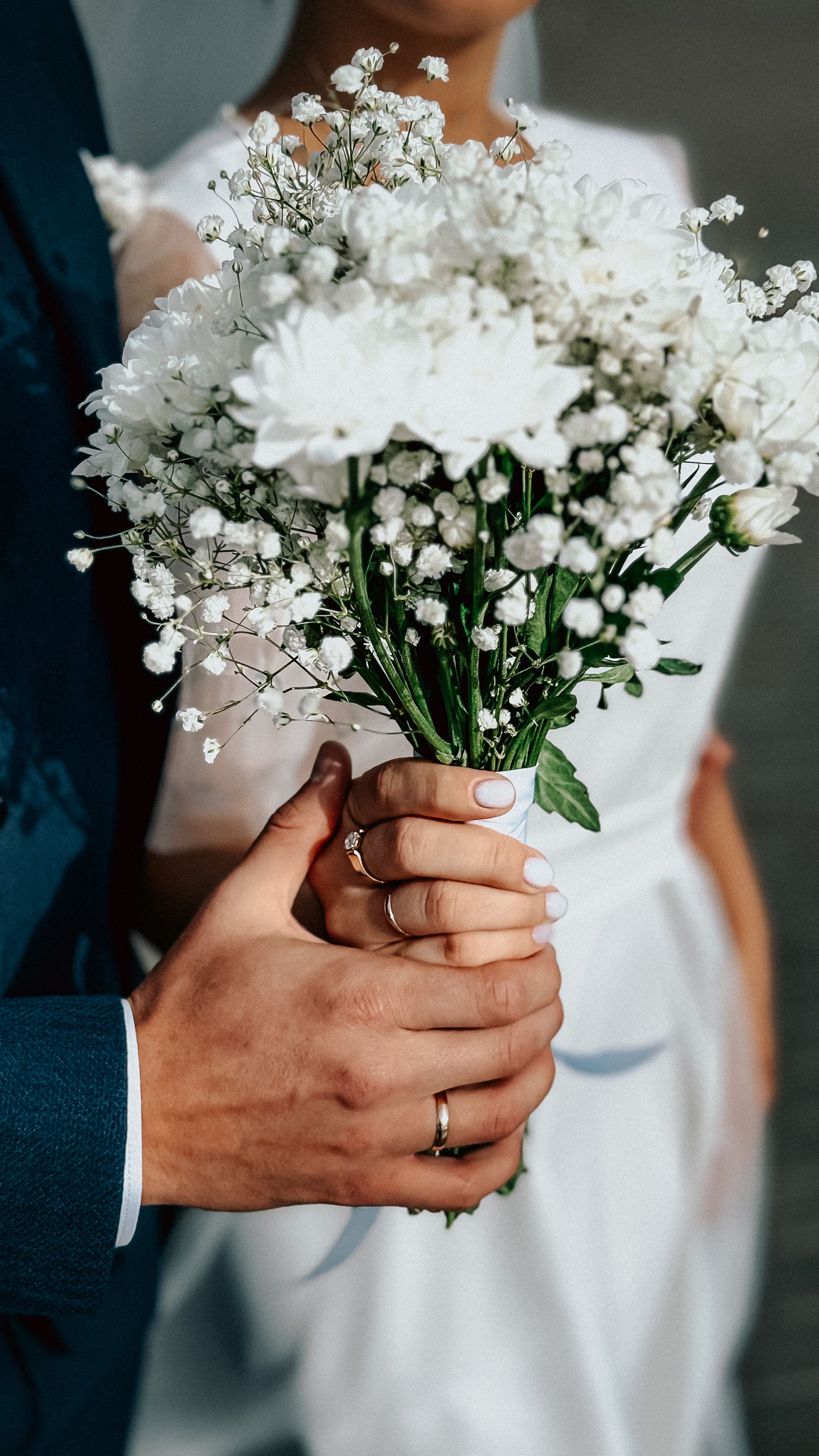 A couple sharing a joyful moment on their wedding day