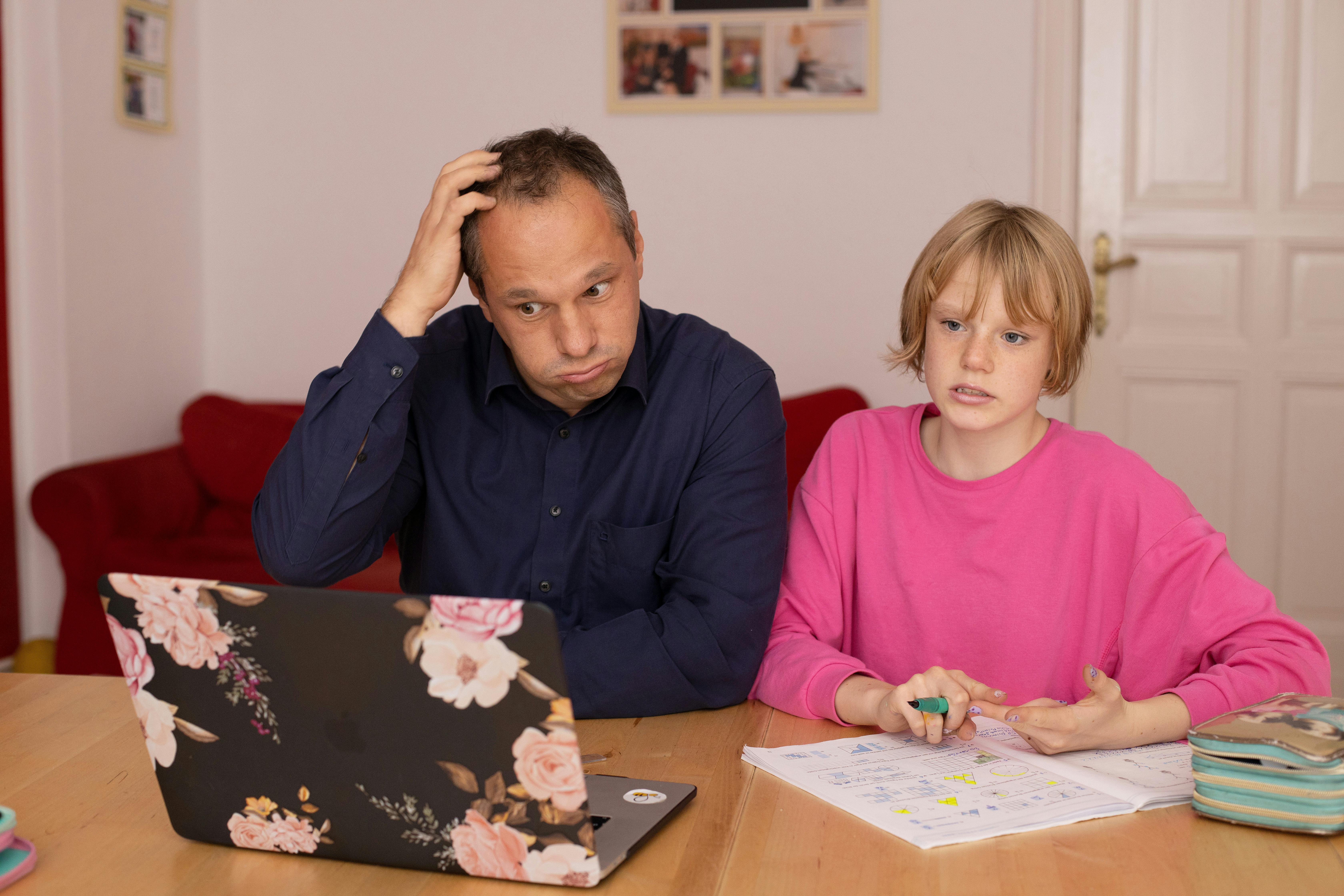Homework time - Dad scratching his head.
