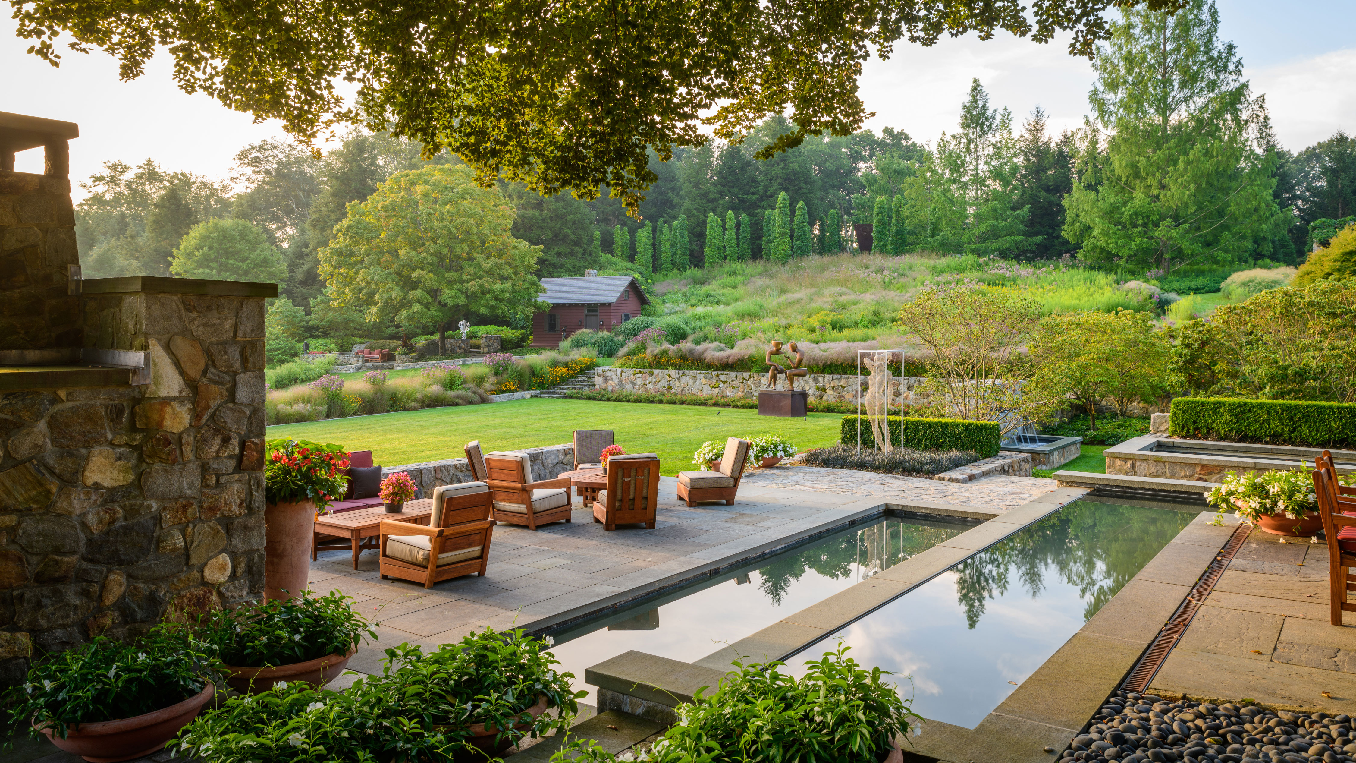 Beautiful landscaped backyard oasis by Christian Complete Landscape
