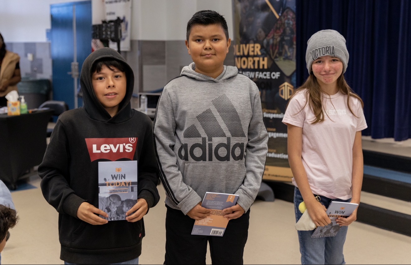 Oliver J. North inspiring students at school event