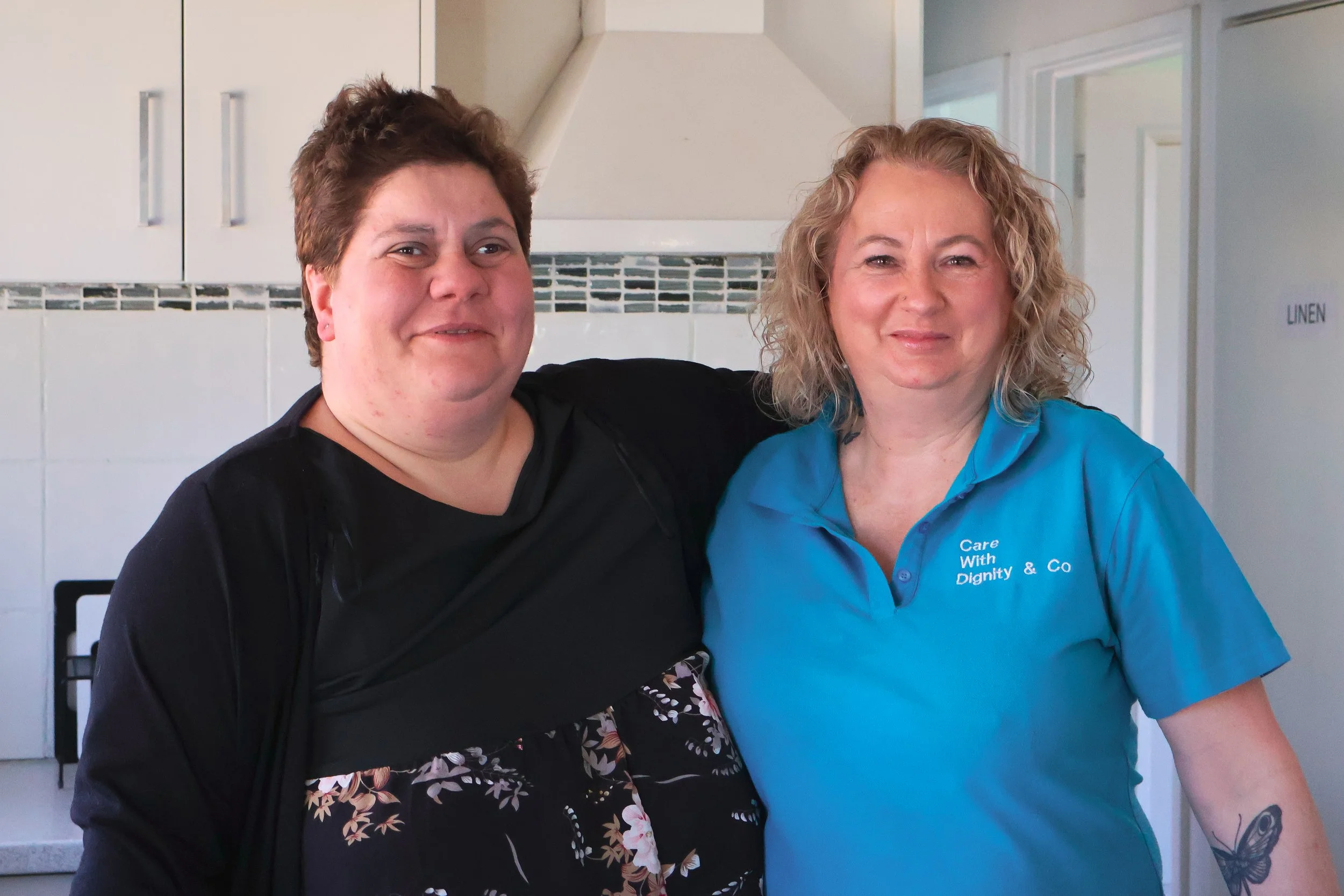Karen with a participant in the kitchen at our Cranbourne home