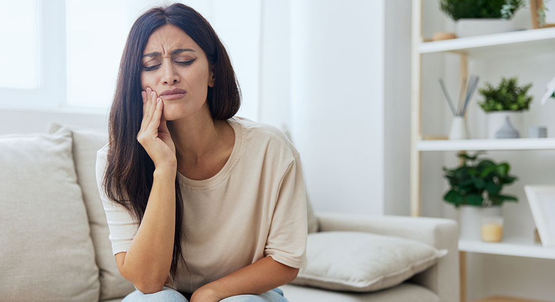 Woman with tooth pain