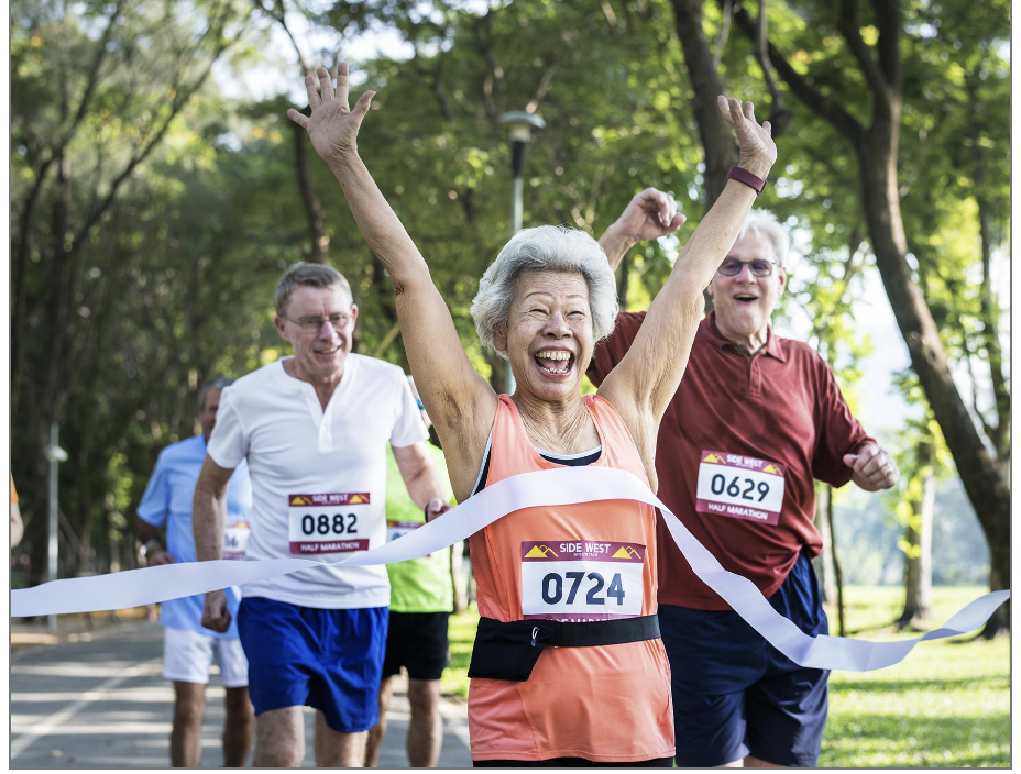 Group of elderly people exercising and smiling Group of elderly people exercising and smiling