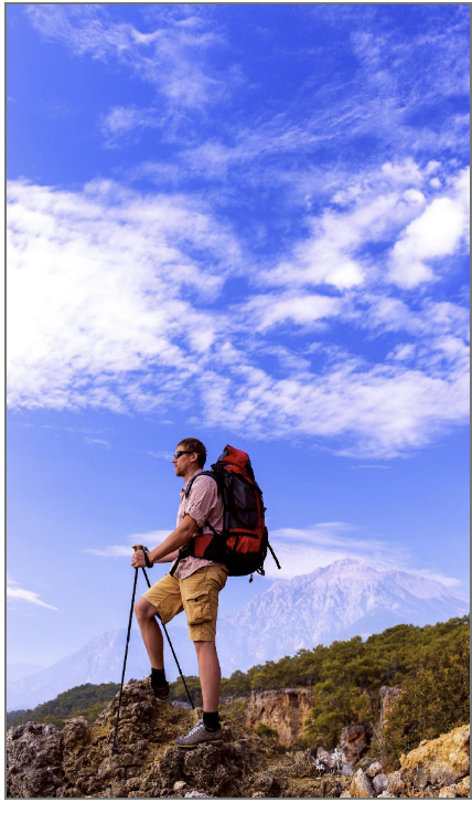 Man hiking a mountain and taking a rest Man hiking a mountain and taking a rest