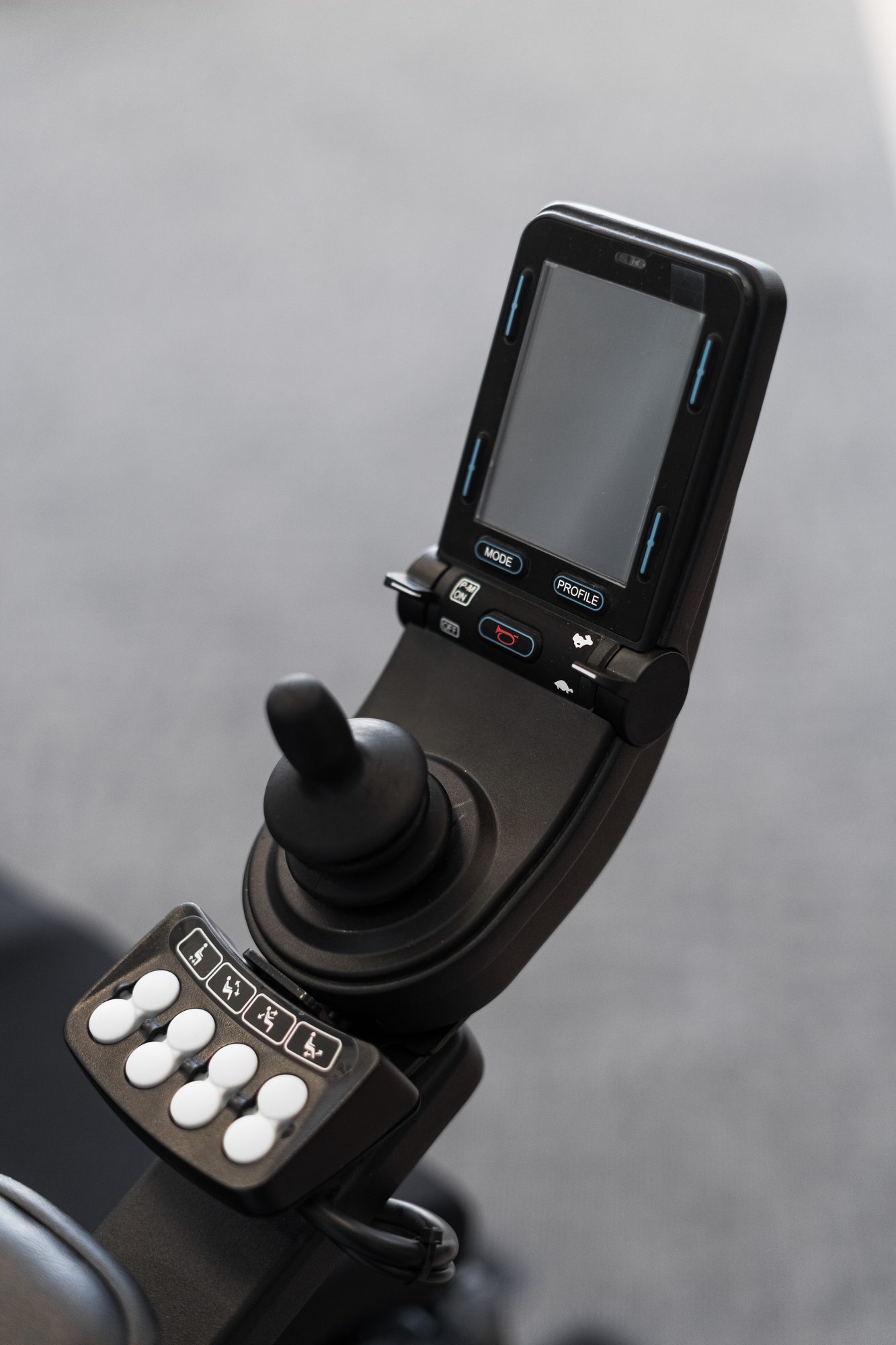 Close-up of a power wheelchair joystick controller