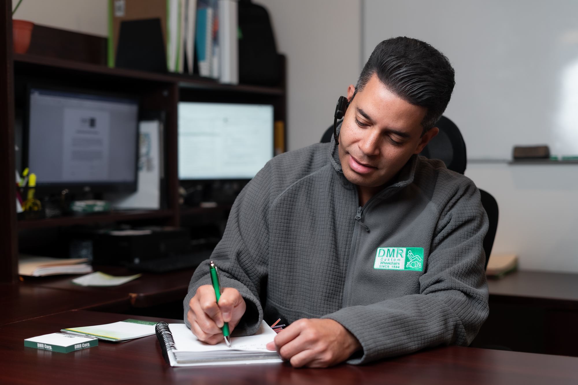 DMR Corp specialist managing insurance paperwork