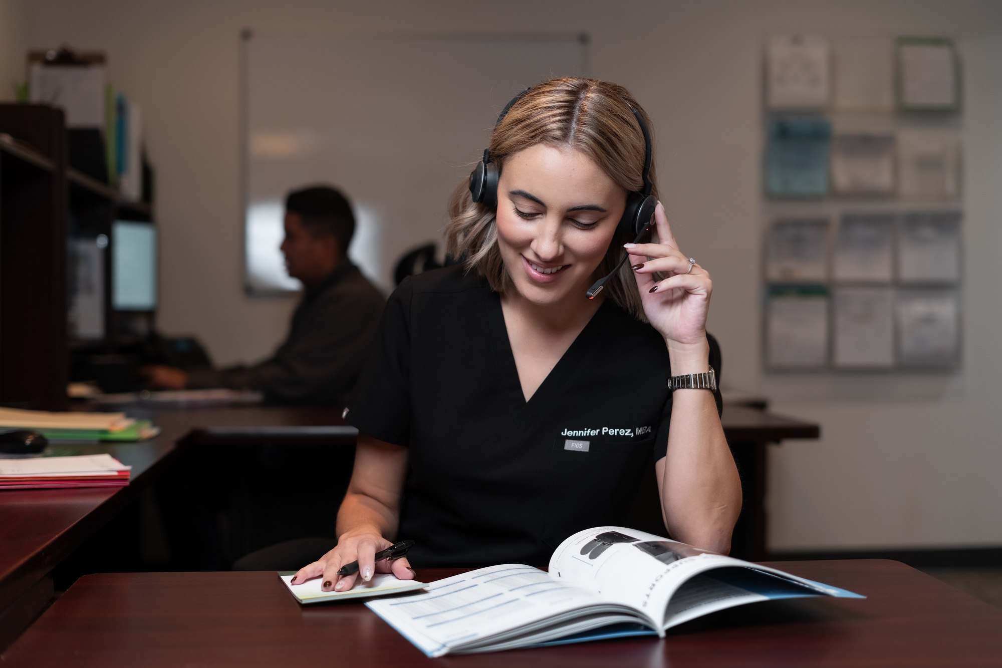 A DMR Corp support specialist assisting a patient