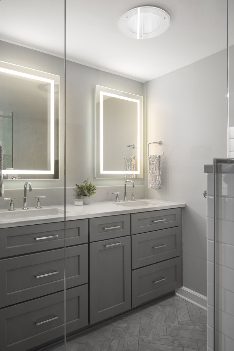 Bathroom renovation with updated shower and coordinated finishes