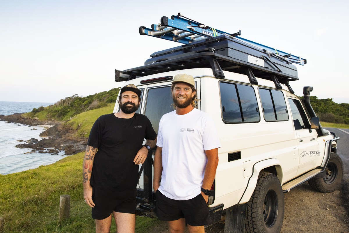 South Kempsey Solar Land Cruiser parked on the coast, with SKS branding on the shirts and door