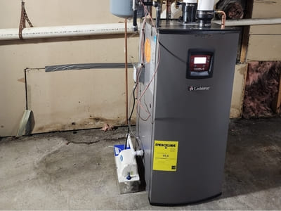 Advanced hot water boiler system installed in a basement, designed for efficient home heating.