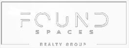 Found Spaces Realty Group logo. The word "Found" appears large in a modern font with "Spaces" centered below it. A thin rectangular box frames the text, broken at the bottom edge where "Realty Group" is displayed.