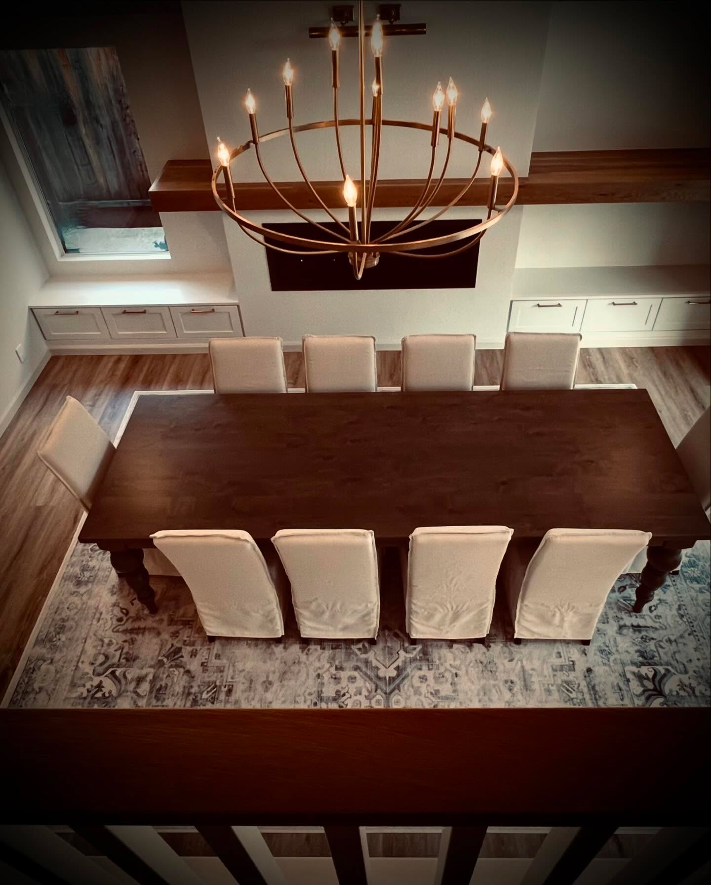 Dining room with chandelier — Niche Construction