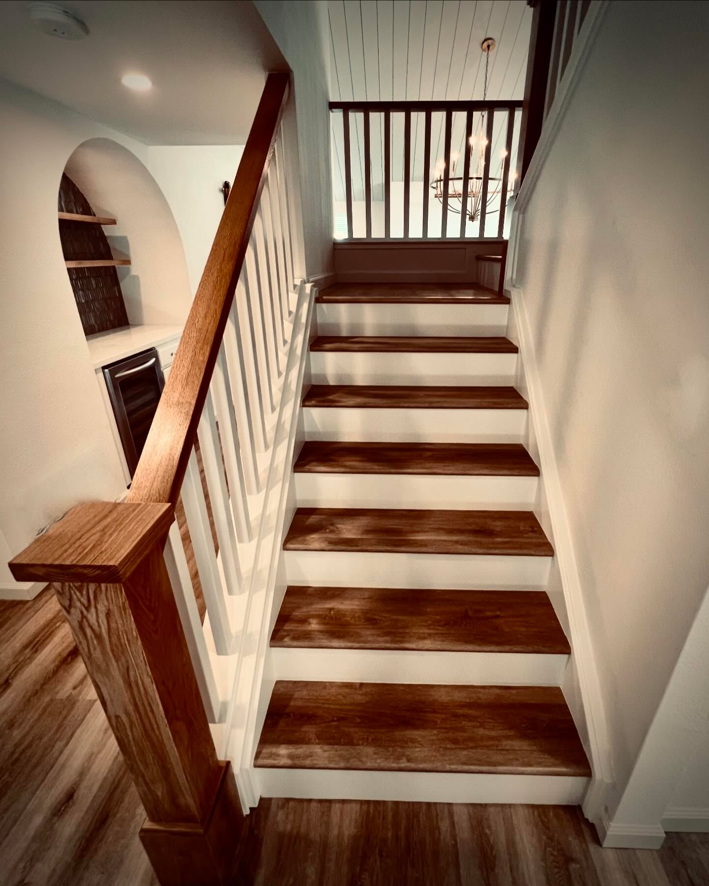 Staircase renovation with wood treads — Niche Construction