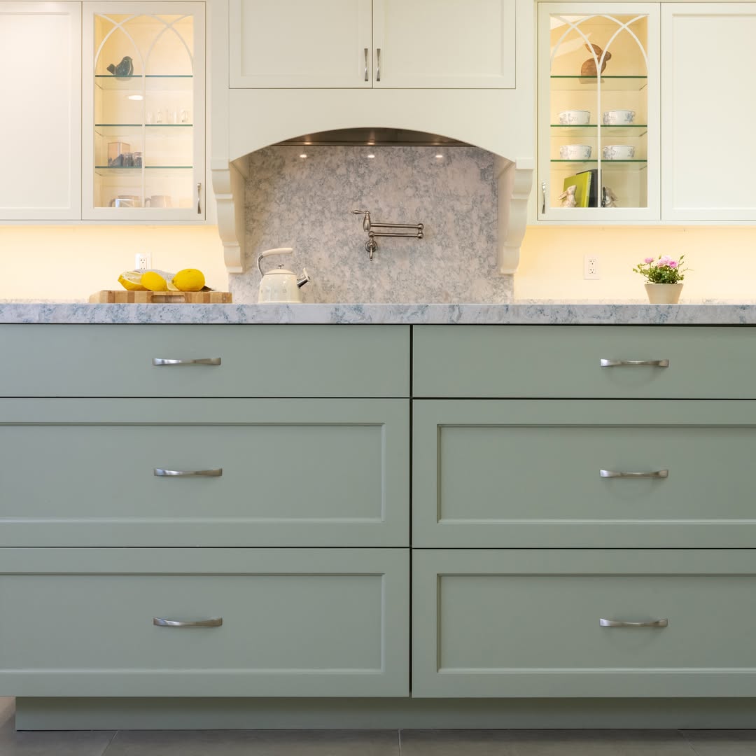 Sage green custom kitchen cabinets — Niche Construction