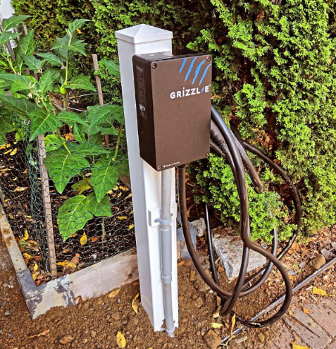 Grizzle-E EV charger installed on a pedestal by Costas Hatzis Electric