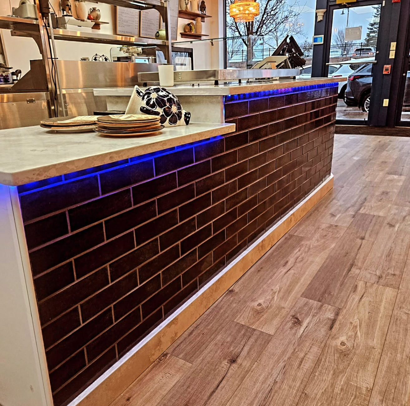 LED accent lighting under a restaurant counter, installed by Costas Hatzis Electric