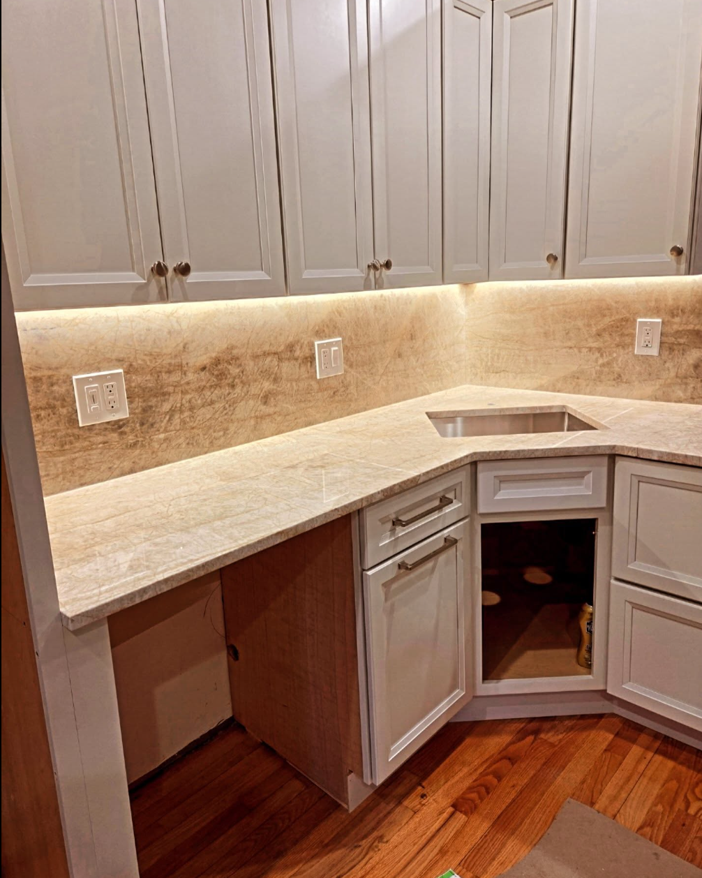 Under-cabinet LED lighting and new outlets in a kitchen, by Costas Hatzis Electric