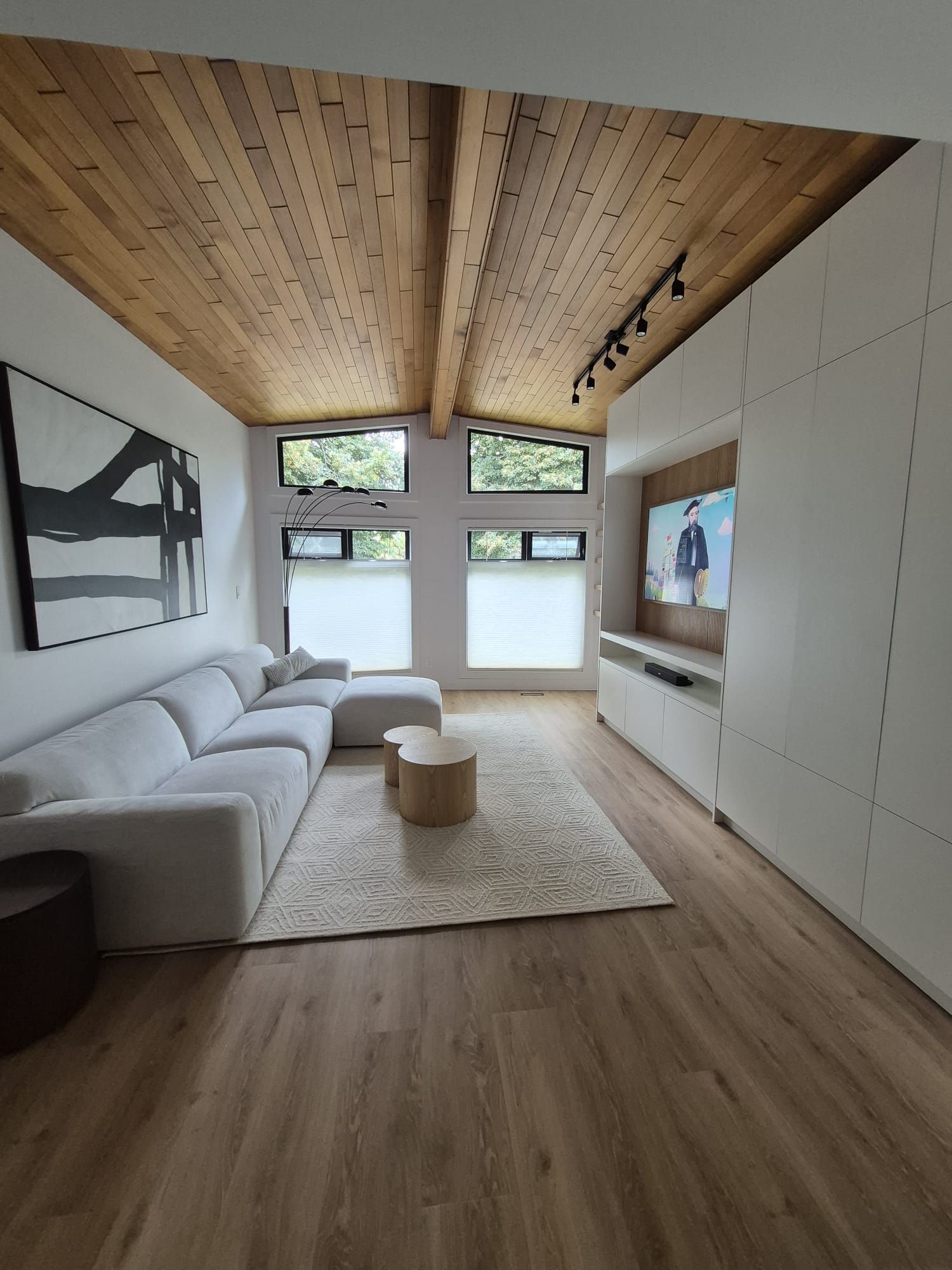 Living room with cedar ceiling, clerestory windows and sectional sofa
