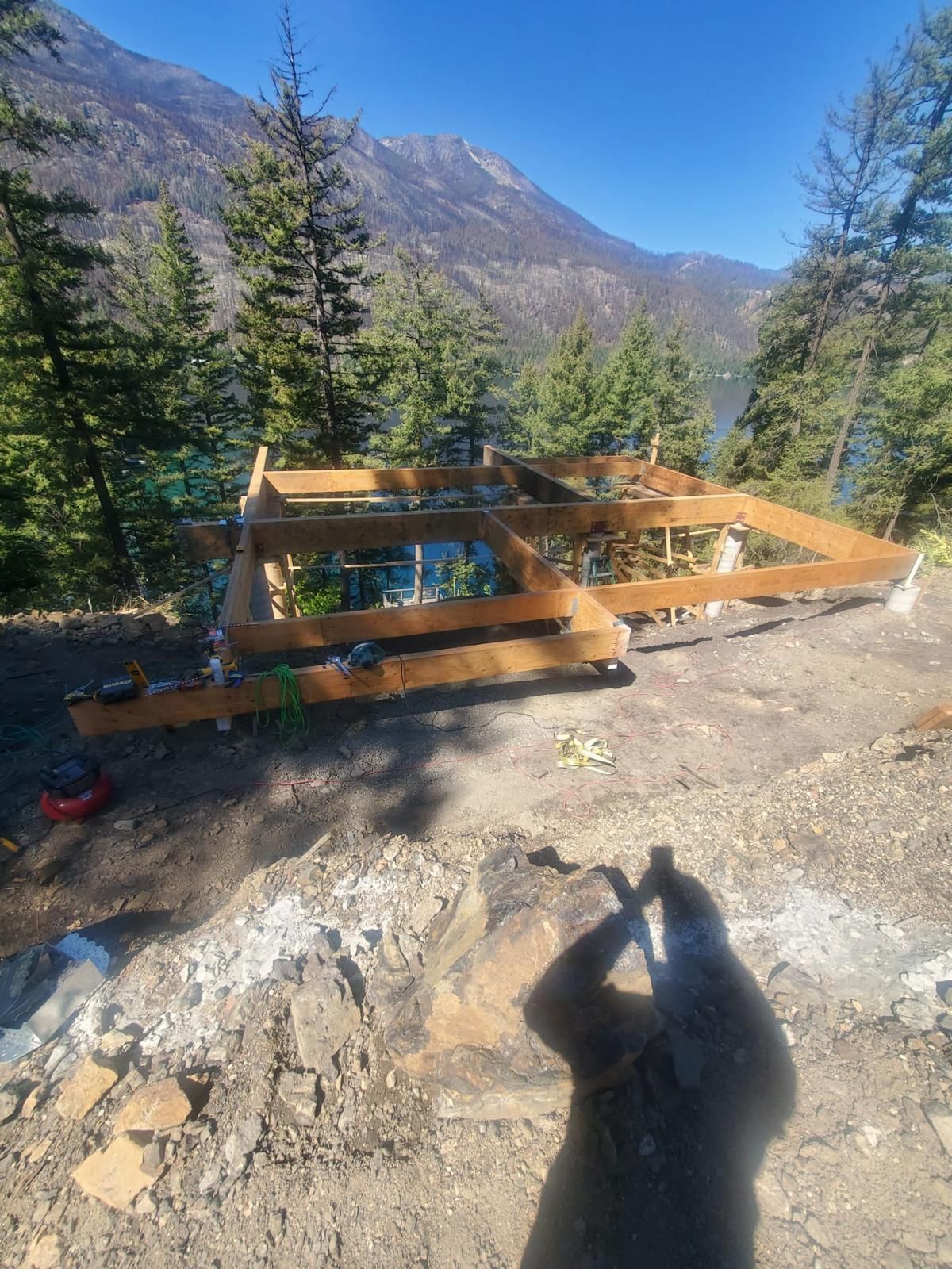 Custom home foundation framing on a mountain building site