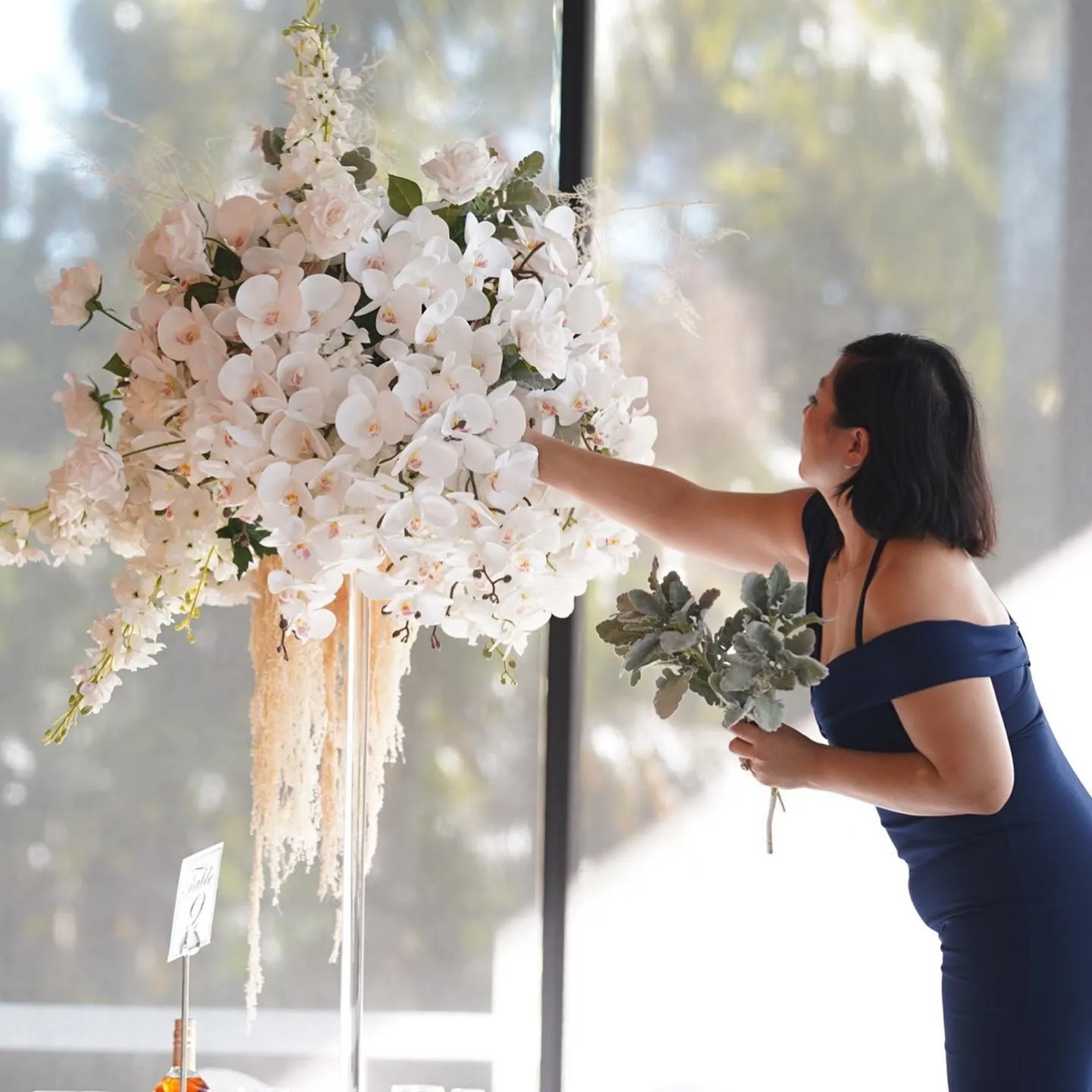 Anna styling a table or installation