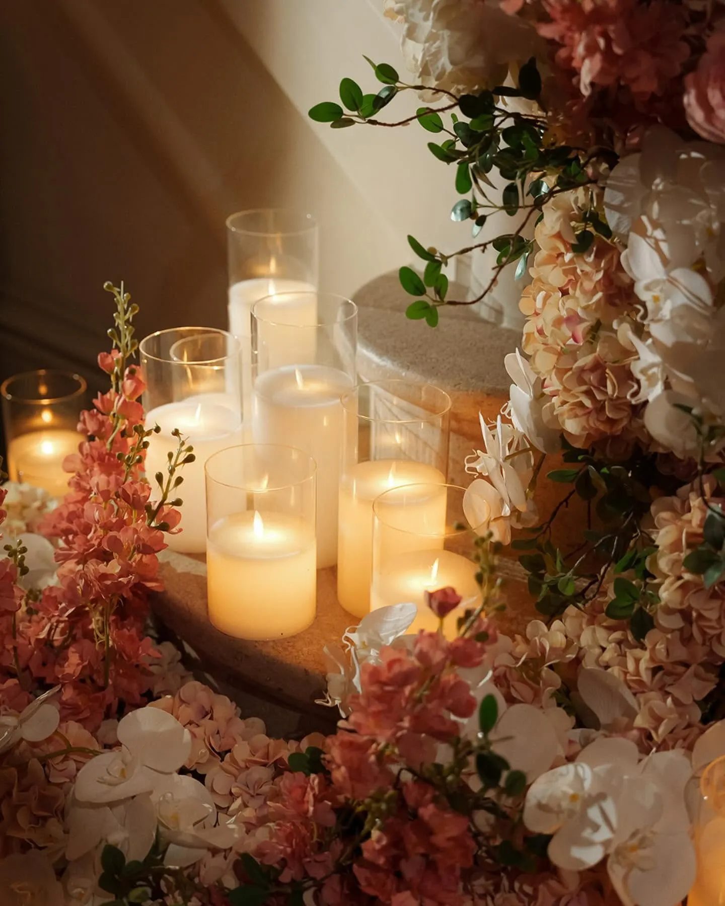 Massed candles at dusk