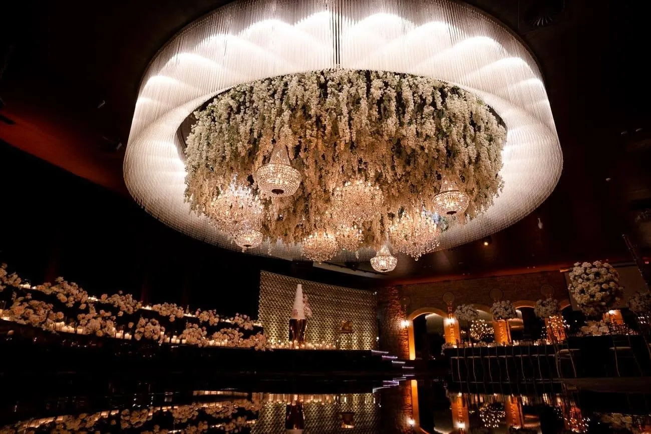 Ceiling draping and hanging greenery