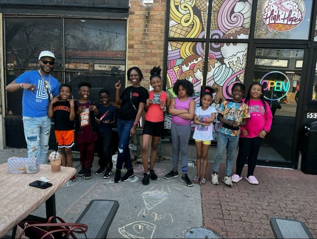 Na'im with young people at a neighborhood event