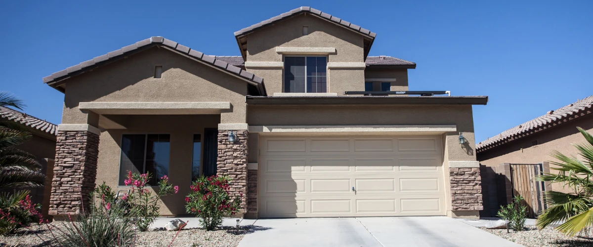 Phoenix residential neighborhood homes with clean driveways and desert landscaping