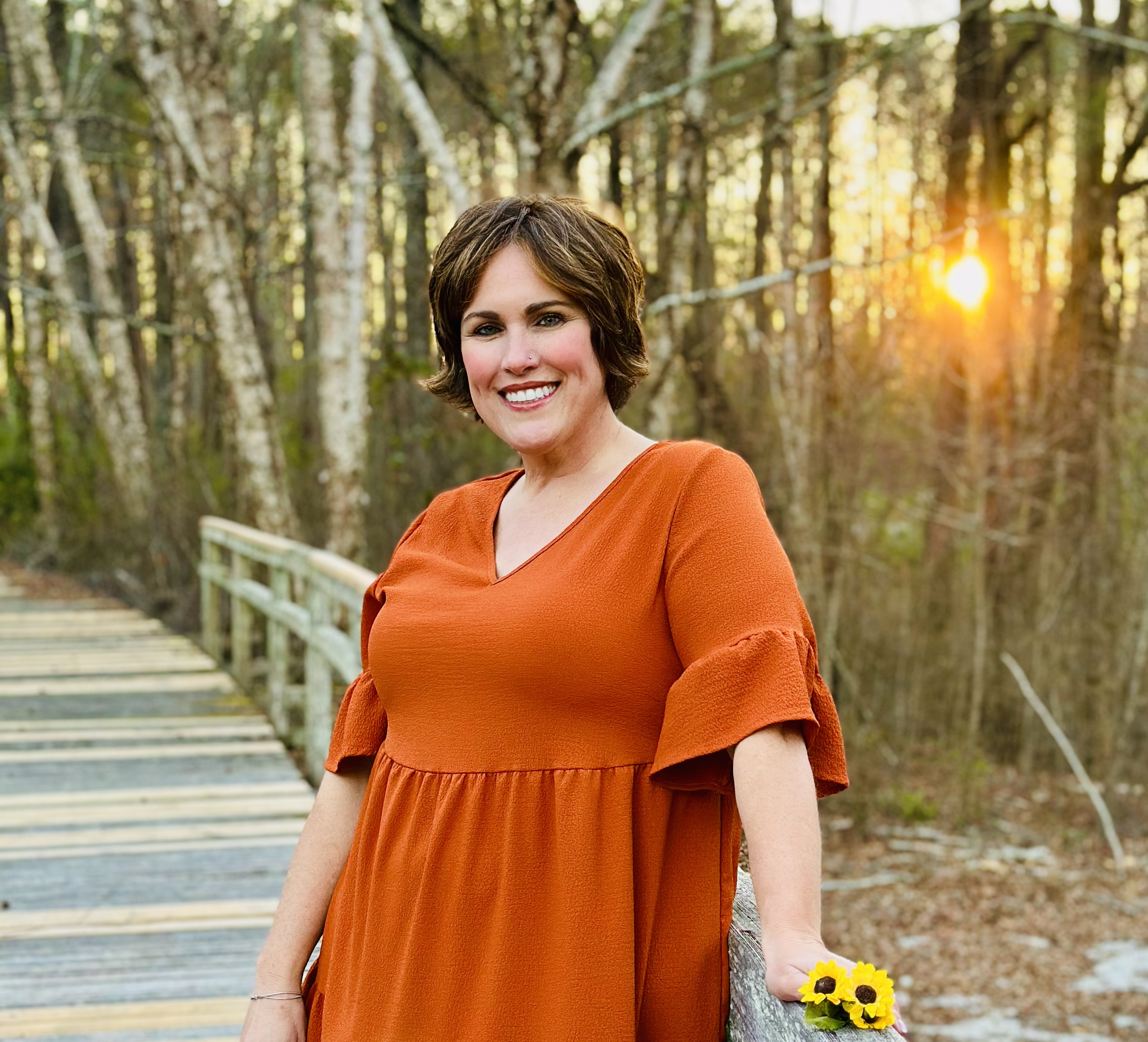 Portrait of Sunny Helms, RDH, OMT, founder of Myo With Sunny