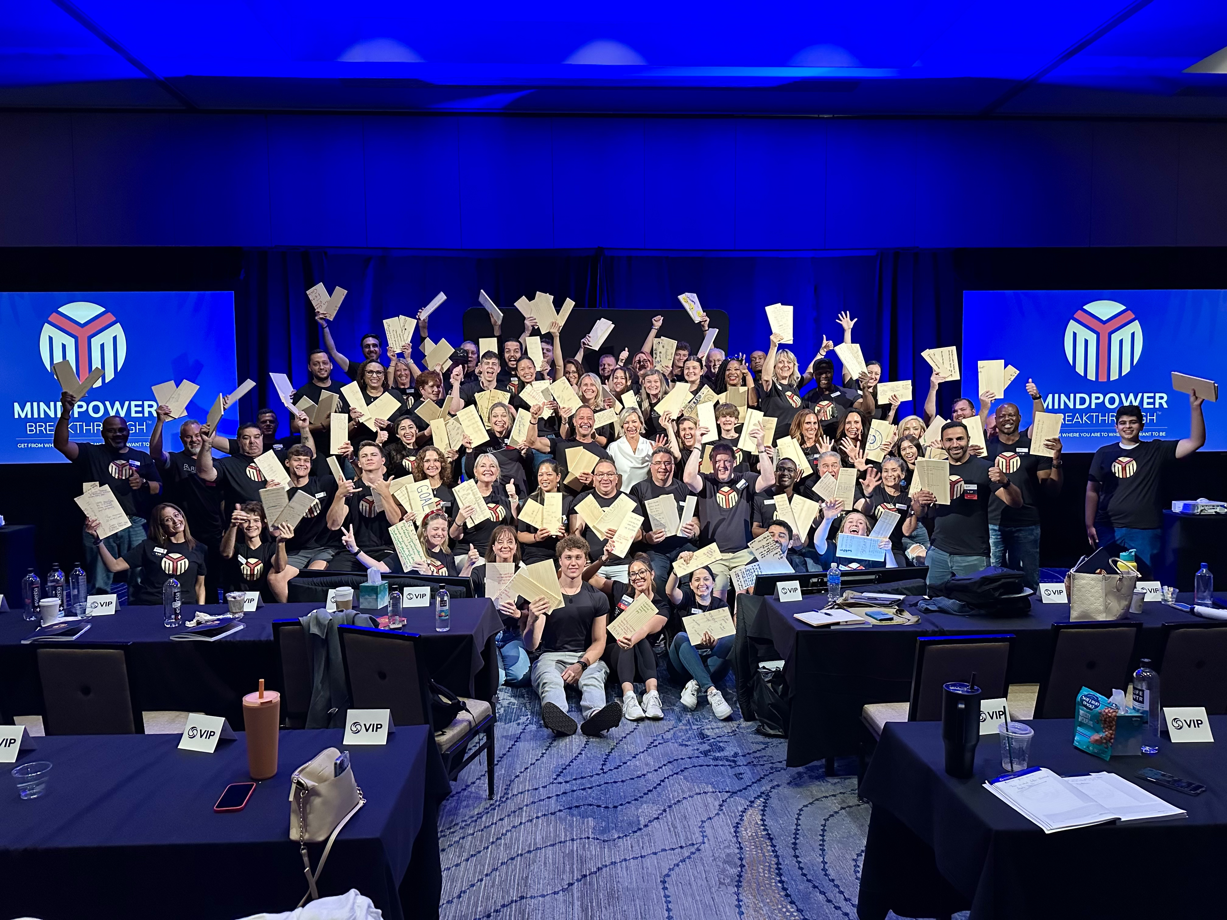 Mindpower Breakthrough graduates celebrating with certificates
