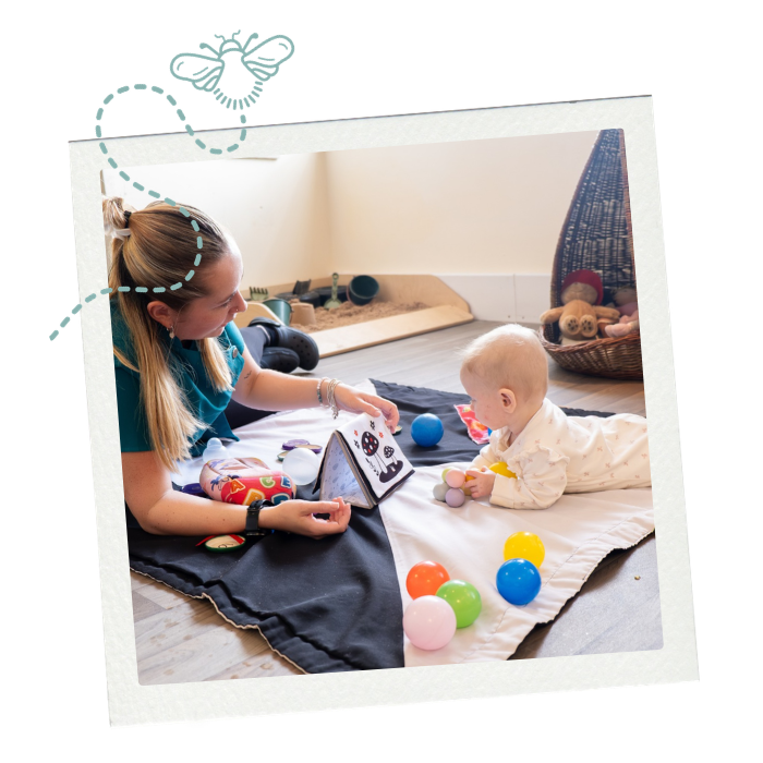 Baby and childcare staff in nursery