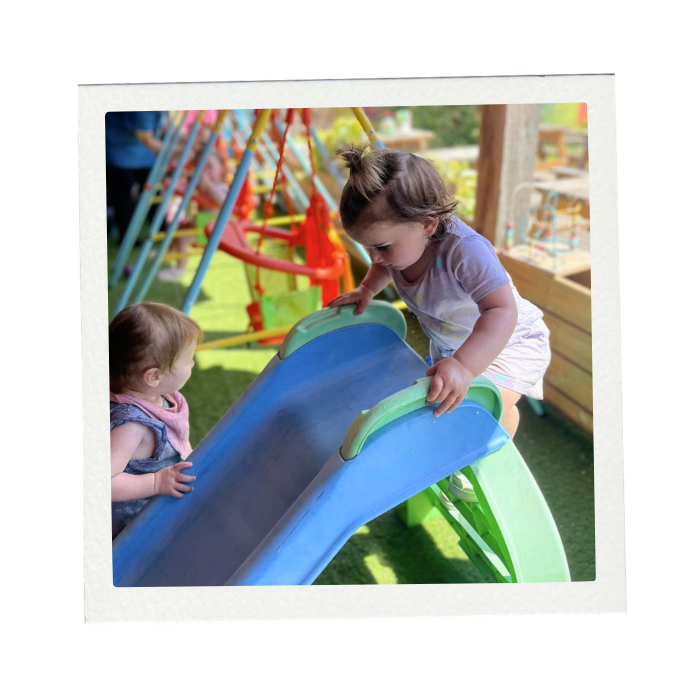 Children playing on slide