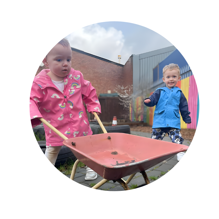 Toddlers playing outside