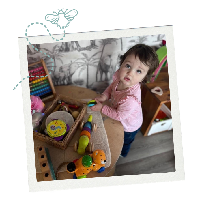 Toddler playing in nursery