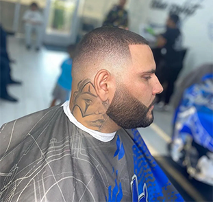 High Fade and beard at barbershop
