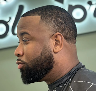 High Taper Fade haircut in barbershop