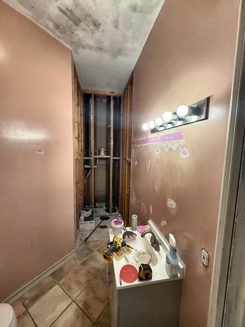 WoodHausWorks completed carpentry and tile project