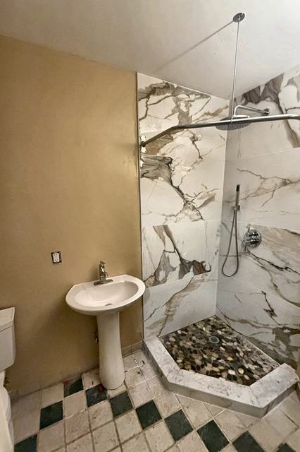 WoodHausWorks completed carpentry and tile project