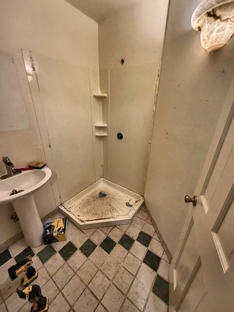 WoodHausWorks completed carpentry and tile project