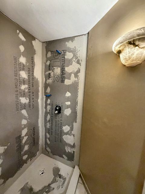 WoodHausWorks completed carpentry and tile project