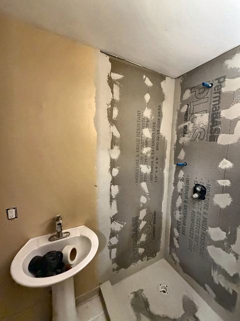 WoodHausWorks completed carpentry and tile project