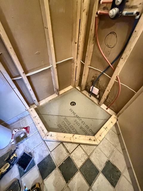 WoodHausWorks completed carpentry and tile project